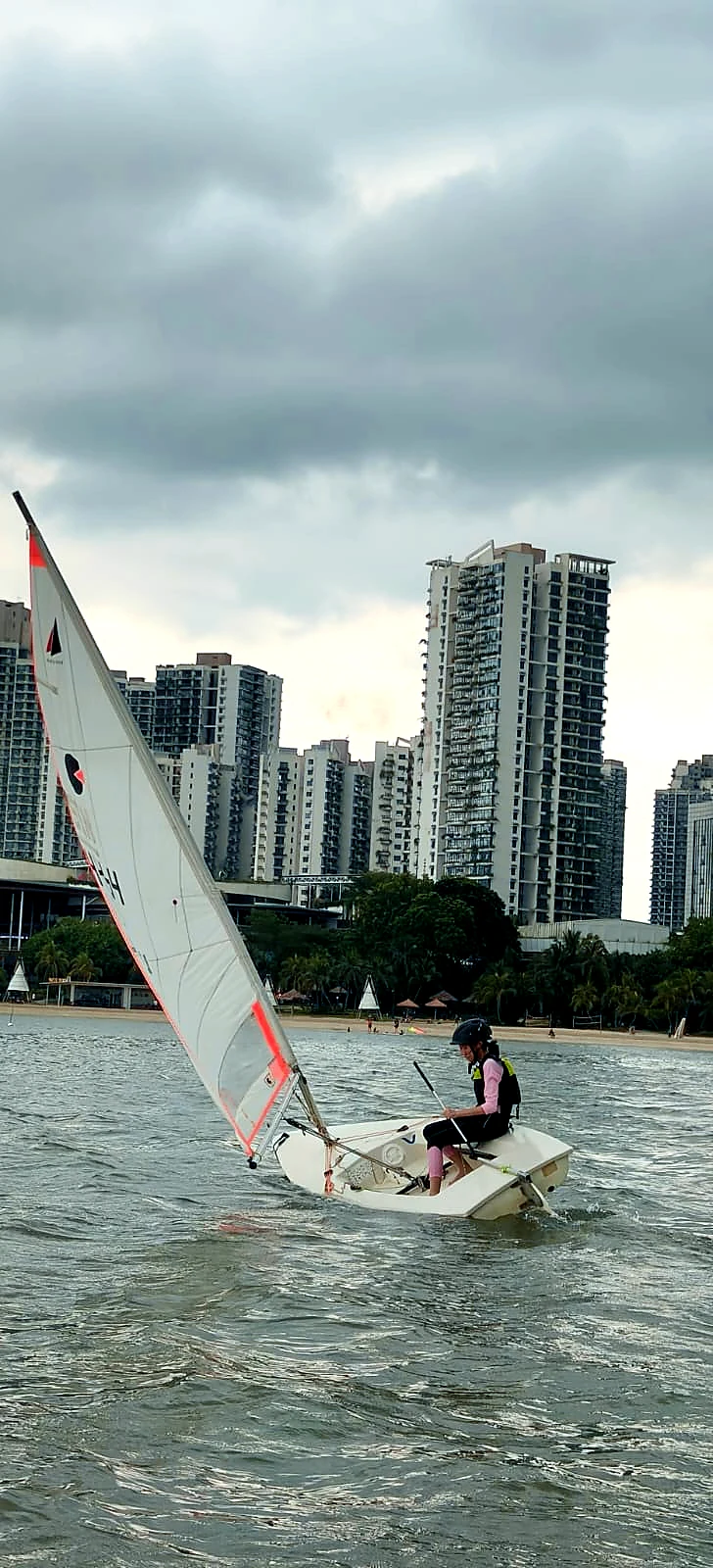 A SeaQuest sailor practising dinghy sailing at Forest City